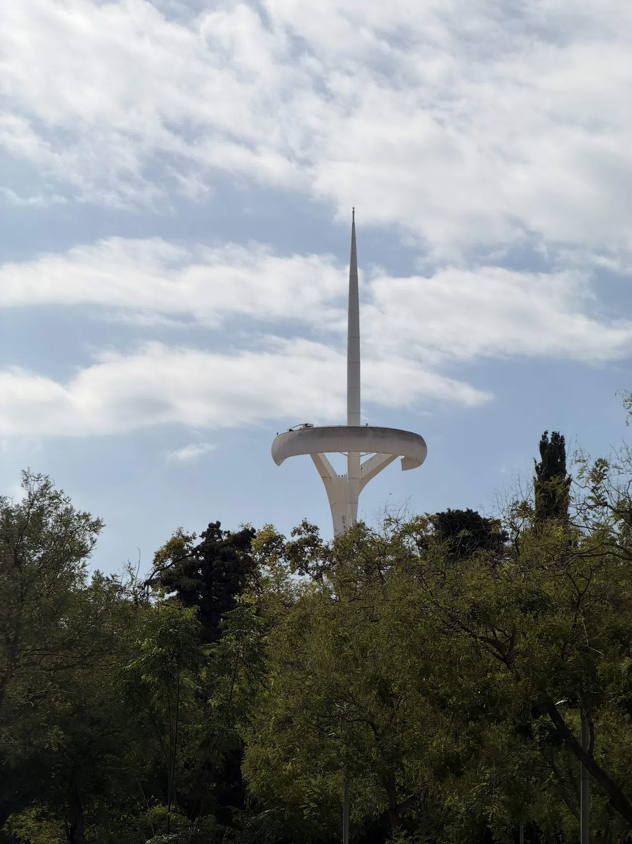 A striking white communications tower · 12:26
